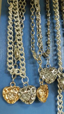 Silver charm . Braclets.