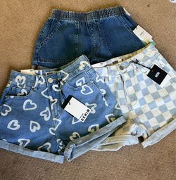 3 Shorts $30.00  Great for back to school.