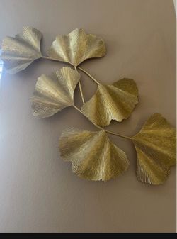 4 pieces gold leaf metal.