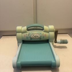 Sizzix Machine With Cutting Pads