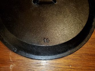 Cabelas 14 Inch Cast Iron Skillet And Lid for Sale in Chehalis, WA