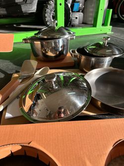 Brand new set titanium pro cookware set 10 pieces  $490 brand new  My price $260 Comes in open box.