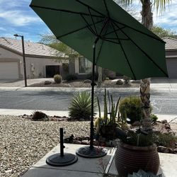 9ft Solar LED Patio Umbrella + Heavy Duty Cast Iron Base - Hunter Green