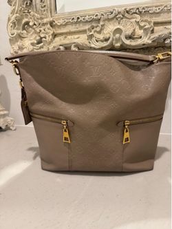 Authentic Louis Vuitton melie empreinte purse