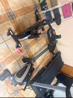 MOVING SALE - Men’s Health Women’s Health Rowing Machine and Stationary Bike Exercise Machine