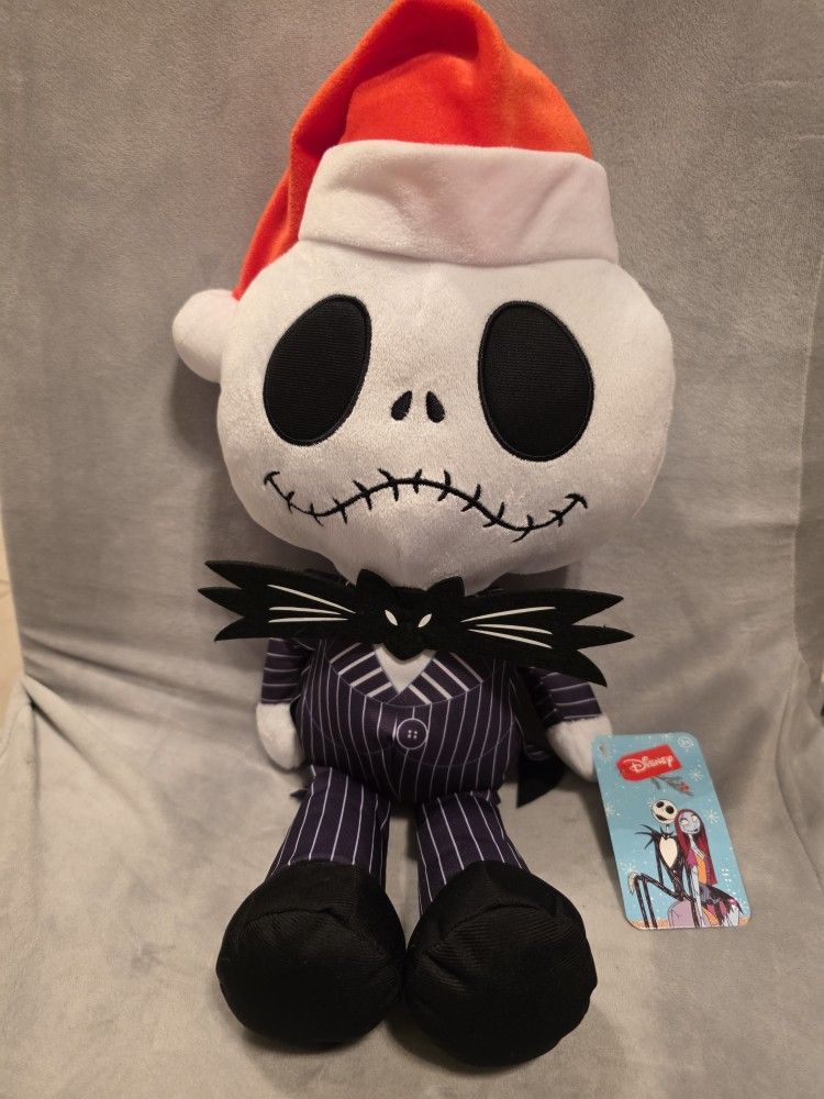 Jack Skellington from Disney's The Nightmare Before Christmas Plush, dressed in a Santa hat.