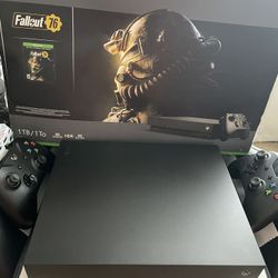 Xbox One X With HDMI Cable,2 Controllers And Box