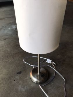 Plug in lamp with built in power source