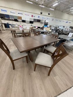 Costco open box Bryce dining table with middle table leaf & 6 upholstered light gray chairs
