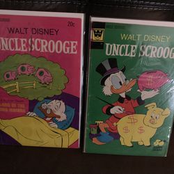 Pair Of Disney Uncle Scrooge Mc duck Comic Books 