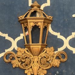 Title: Vintage HOMCO Gold Wall Lantern Plaque – Ornate Grapevine Scroll, 25” x 16”  Description: Add timeless Hollywood Regency charm to your space wi