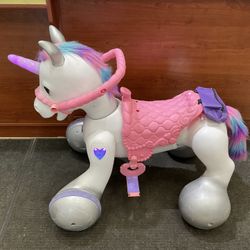 Kid Trax 12V Rideamal Unicorn Interactive Ride-On Toy with Lights & Sounds