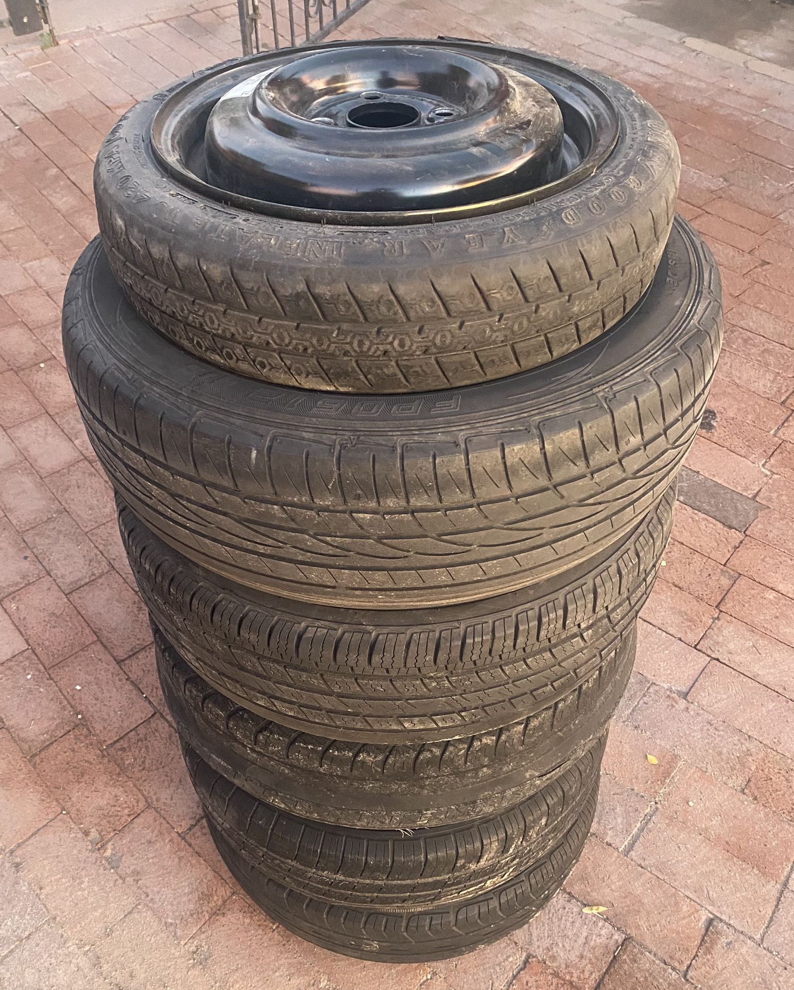 Five (5) 4x100 bolt pattern 14” inch black steelies