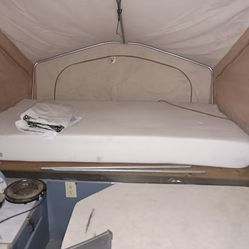 Pop out camper