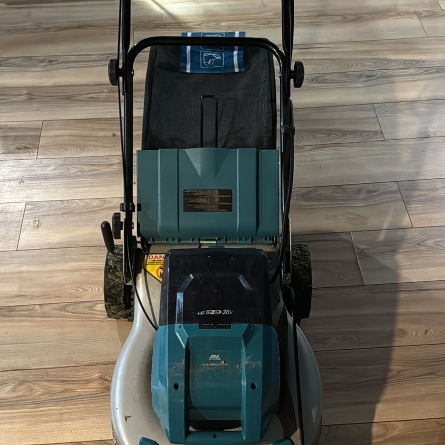 Makita Battery Operated Lawn Mower + Batteries And Charger 