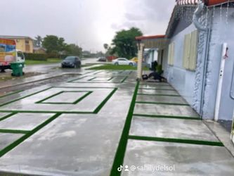 Artificial Grass And Concrete Slabs