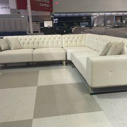 r beige sectional with sleeper/chaise option ,
Available in gray, black and beige