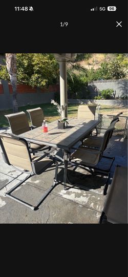 Patio table and 6 chairs