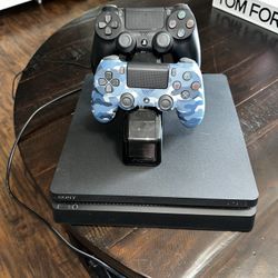 PS4 With Dual Controller Charger And 10 Games 