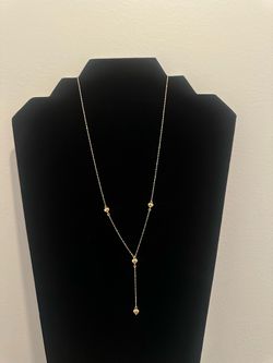 Women's chain, made of 10k gold. / Cadena para mujer, es de oro de 10k.