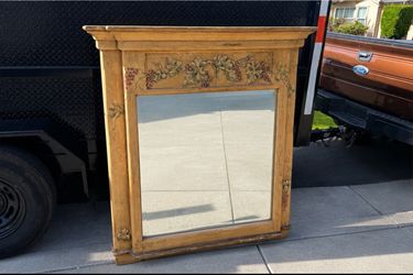 The Farmhouse Collection decorative mirror with grape vine details