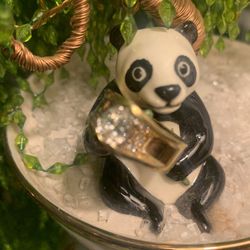 Ladies diamond wedding style ring featuring one modified Pear shaped diamond total affiliated weight of 1 carat suspended in an Arch Cathed