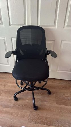 Brand New Primy Office high chair with folding armrests