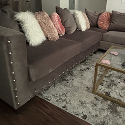 Grey Sectional With Grey And Pink Pillows