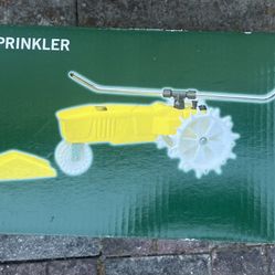 Brand New Nelson Rain Train Traveling Sprinkler for Yard, Heavy Duty Rotating Lawn Sprinkler with Large Area Coverage