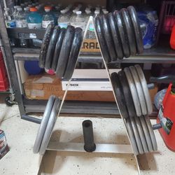 Weight rack plus 205 pounds of weight plates