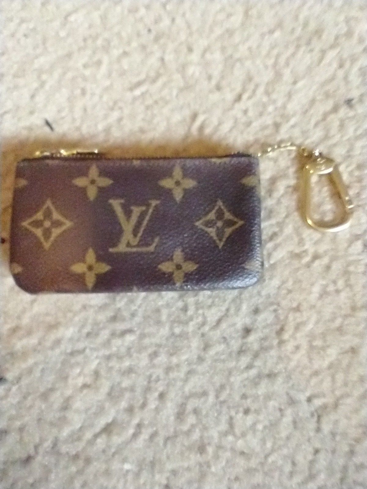 Louis Vuitton coin purse ($400 value)