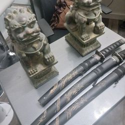 Statue And Samurai Sword Katana