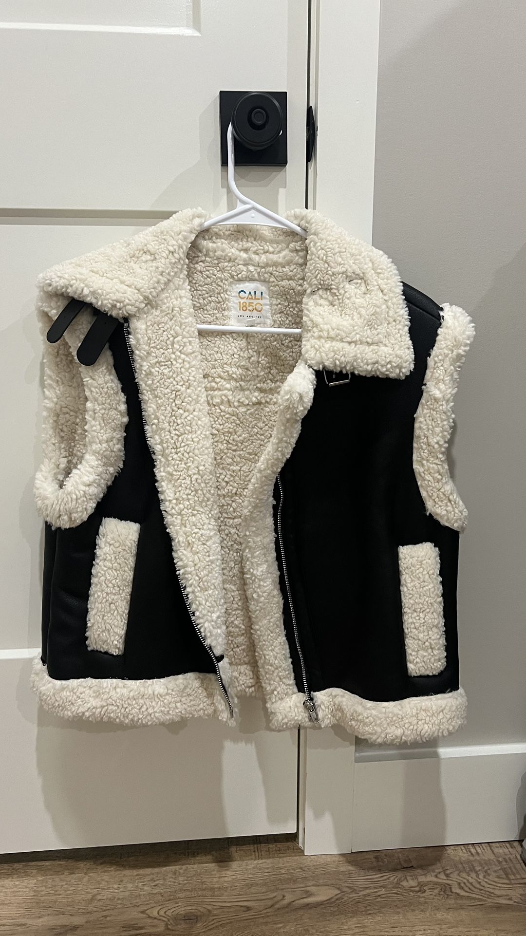 Leather and fur vest