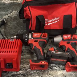 Milwaukee Impact Gun And Drill