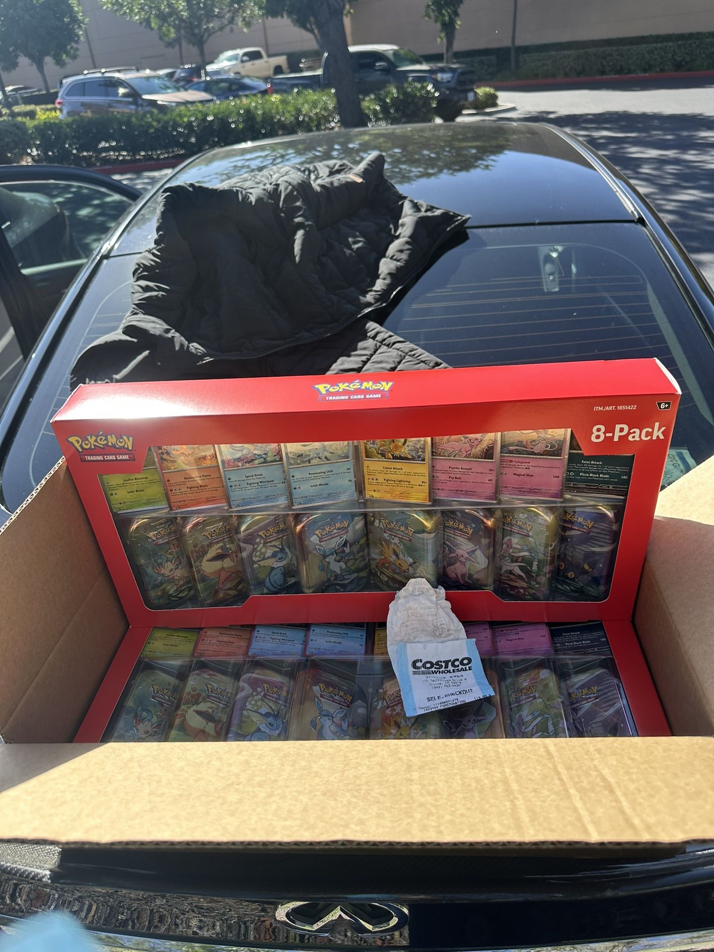 Prismatic Evolution Costco Exclusive 8 Tins Per Box