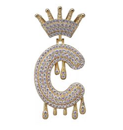 Iced out initial pendant with Cuban link chain