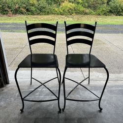 Two Wrought Iron Chairs
