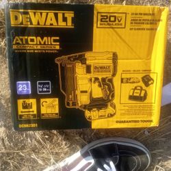 Dewalt Atomic Series Nail Gun With Battery, Charger, And A Tool bag And Bekt