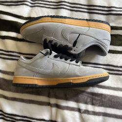 grey and black dunks size 8.5