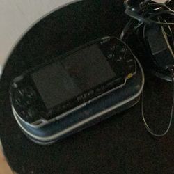 PSP with you game works very good. Excellent condition with three game and Charger 150