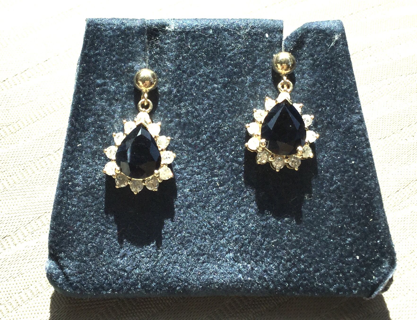 Laura Ramsey 14k Yellow Gold Sapphire Diamonds earrings, updated information verified by Local Gig Harbor Jeweler.