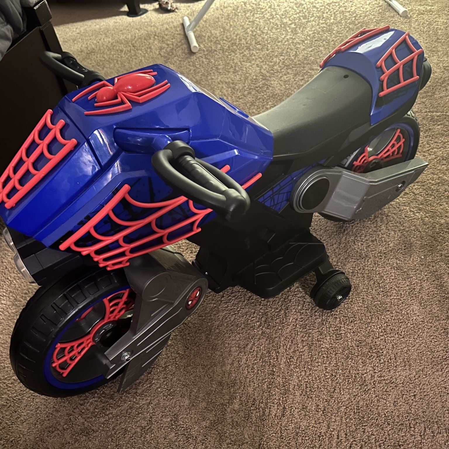Power wheels cheap spiderman motorcycle