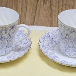 Pair of Russian Porcelain Demitasse Cups & Saucers – White Floral Design