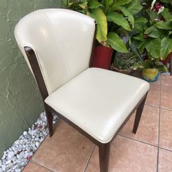  Chairs (2),  wood & leather, beige, great condition, no rips or tear at a great price!! Only $45 -we located in Miami Beach off 91st St. and Collins 