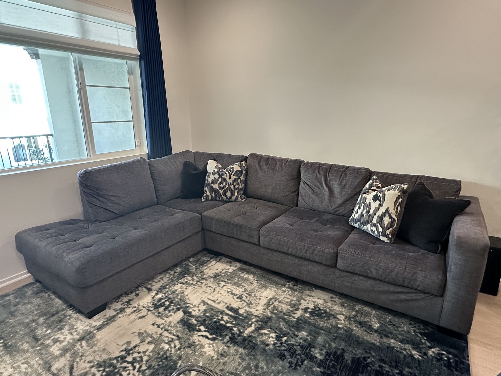 Grey Two Piece Sectional Couch.
