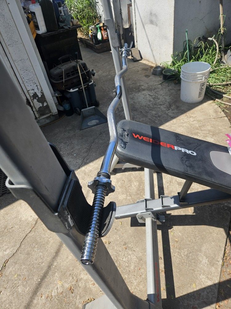 Chrome Standard 1 inch curl bar with spin lock collars like new. Bench not Included.