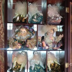 Set of 8 collectable Porcelain Miniature Dolls for Sale 