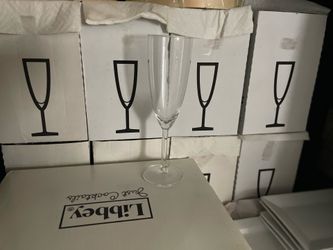 7 boxes of Champagne Flutes