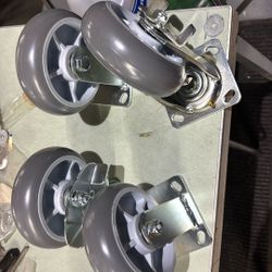 heavy-duty swivel caster wheel with a brake mechanism and a gray thermoplastic rubber 