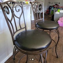 2 Swivel High Back Chairs